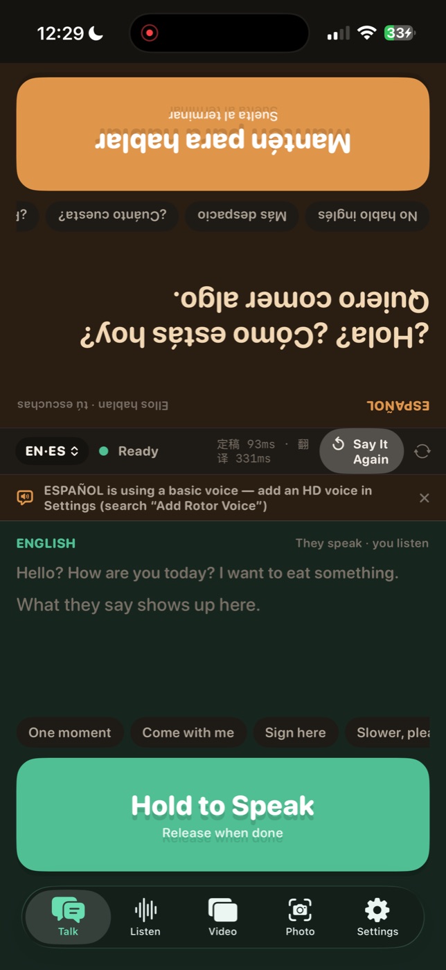 Real Talk conversation between English and Spanish: the flipped orange pane reads a Spanish question above the big Hold to Speak button